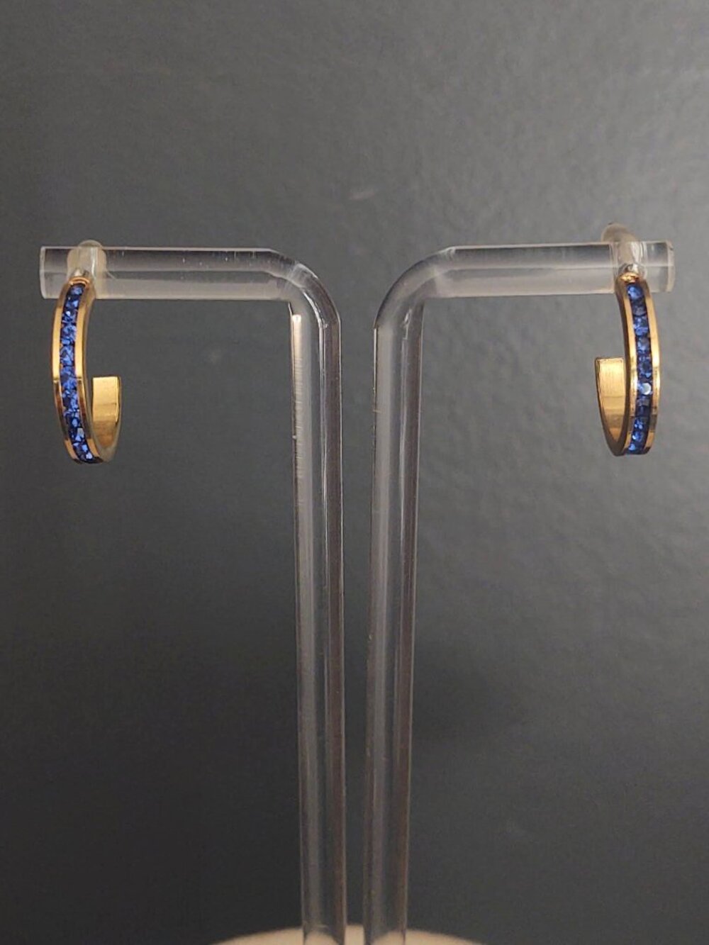 Gold C-hoops with inlaid blue crystals